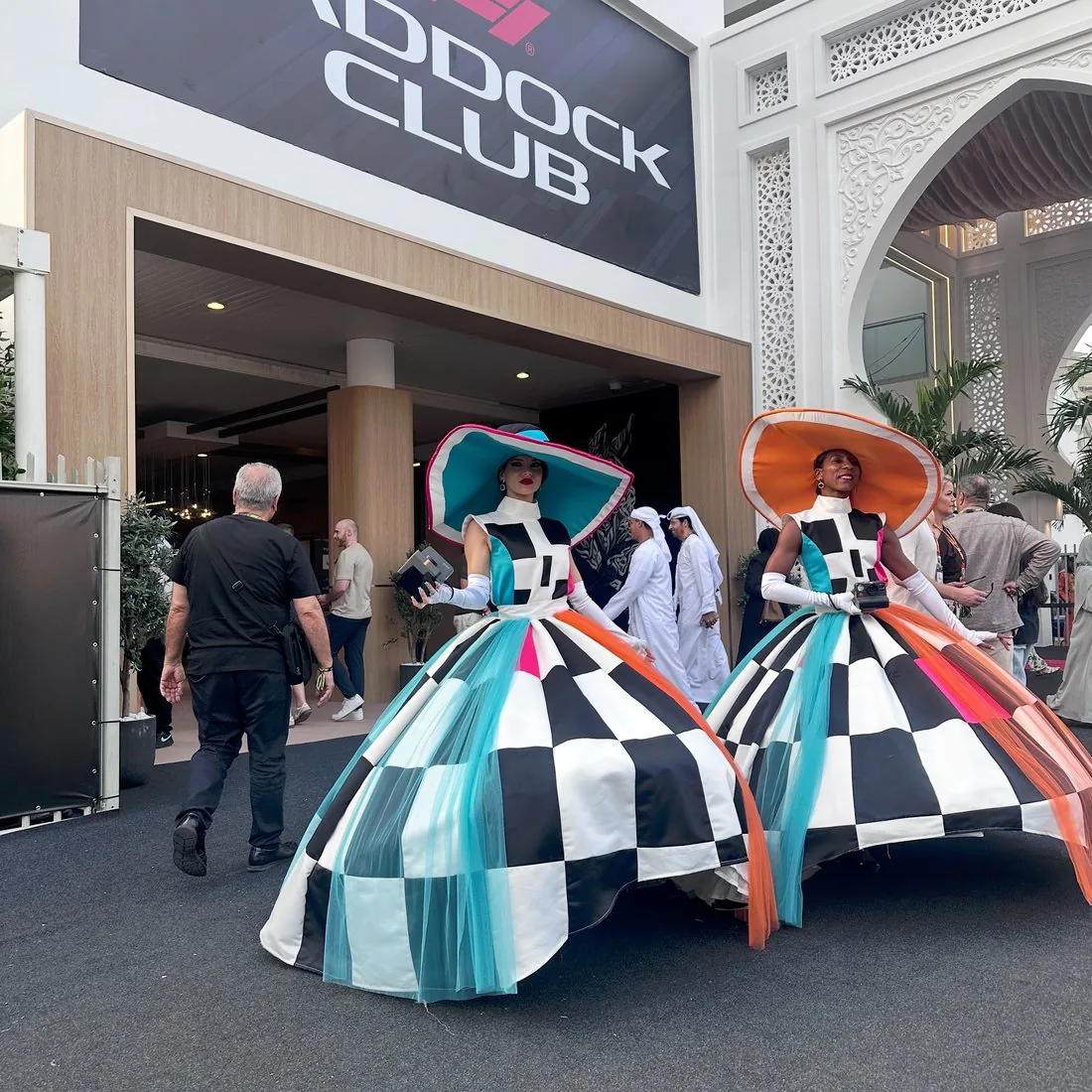 F1 ADGP costumed performers at the Paddock Club entrance