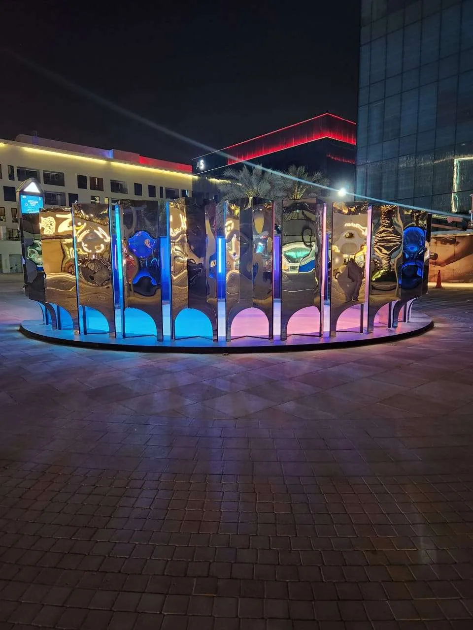 Kaleidoscope mirrored pillars at night