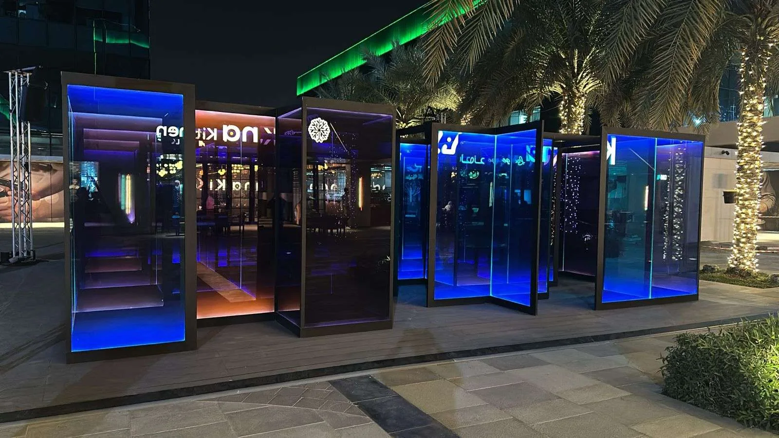 The Maze glass installation illuminated at night